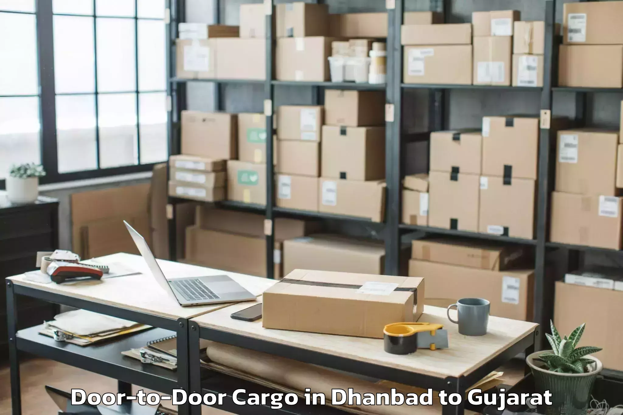 Hassle-Free Dhanbad to Bhanvad Door To Door Cargo